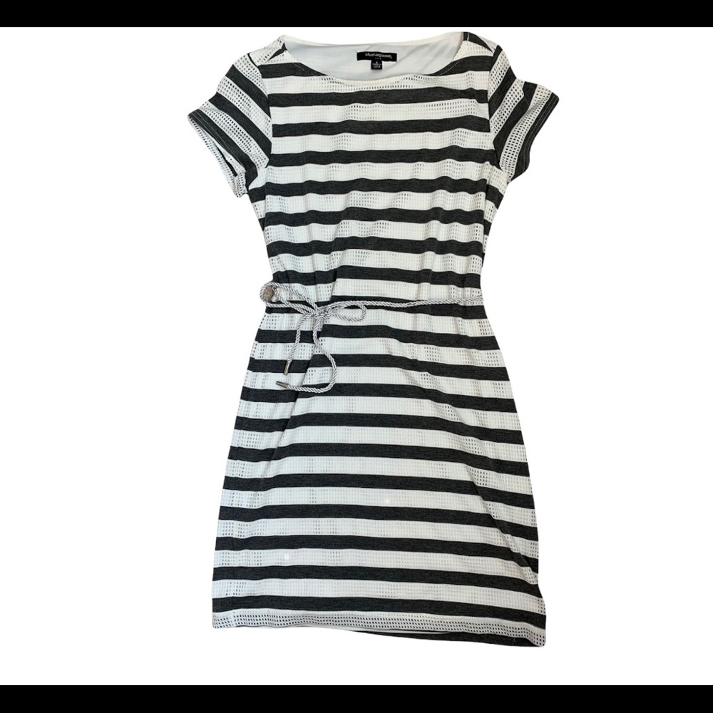 Woman’s grey and white dress